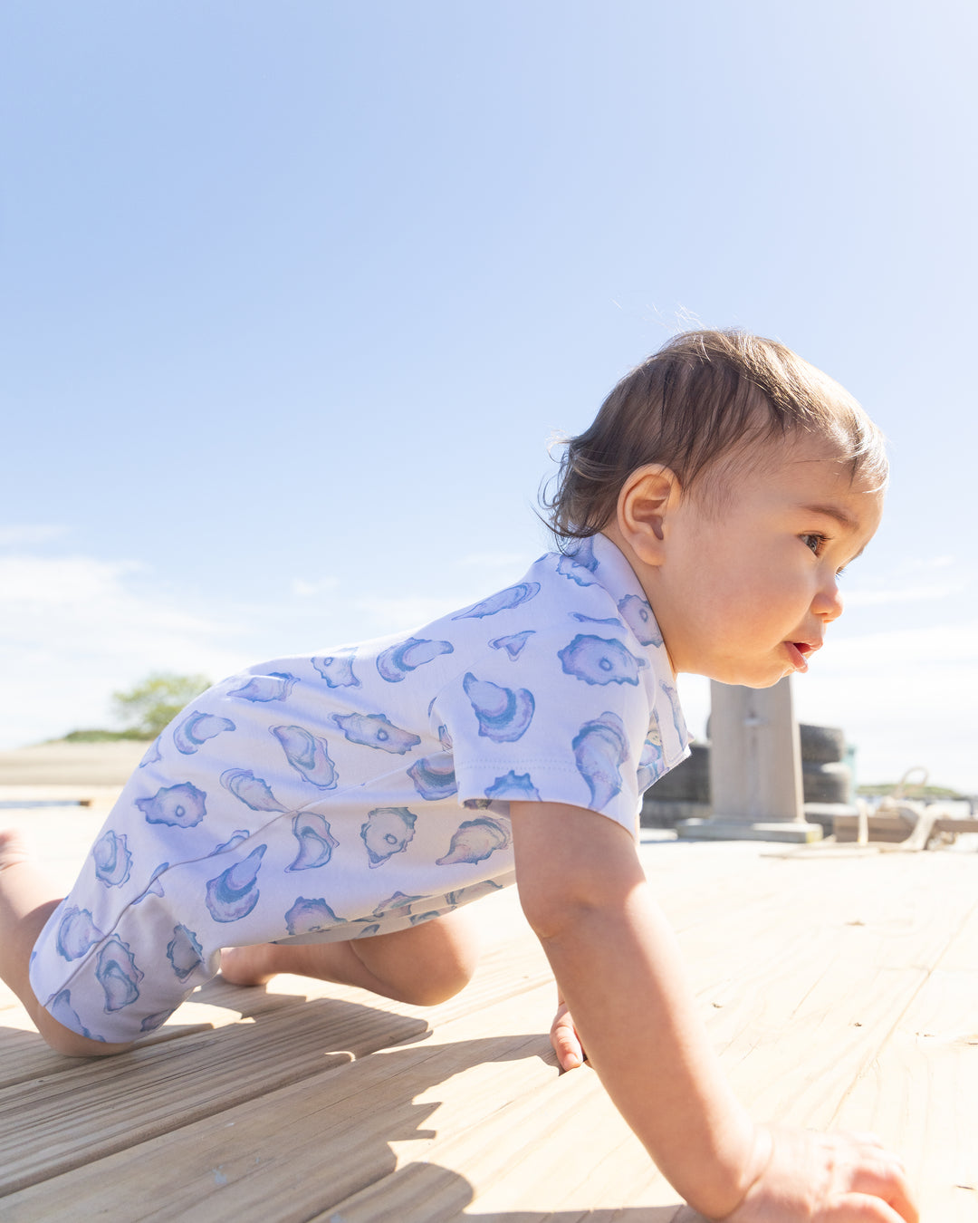 The World is Your Oyster Portside Polo Romper