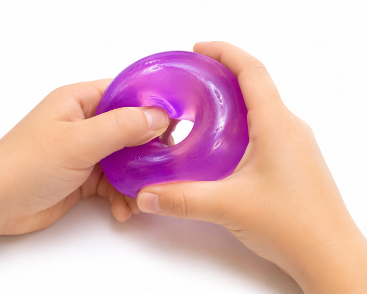 FEELZiES™ Jelly Donut Squishy™ – Wearable Sensory Fidget: Grape Glaze